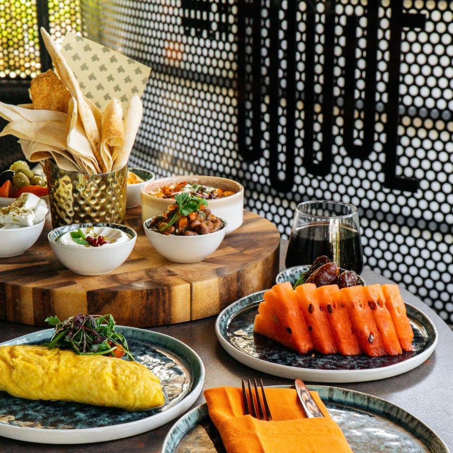 Somerset West Bay Доха Екстер'єр фото A selection of dishes at the restaurant